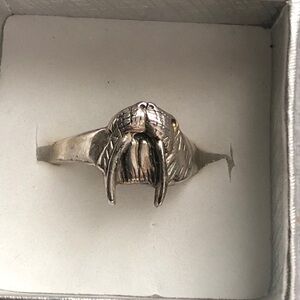 Sterling silver walrus solid ring.